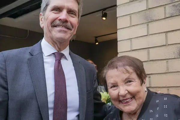 Envision CEO celebrates the retirement of a board member.
