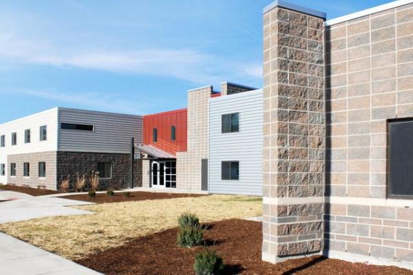 An exterior of a housing complex is pictured