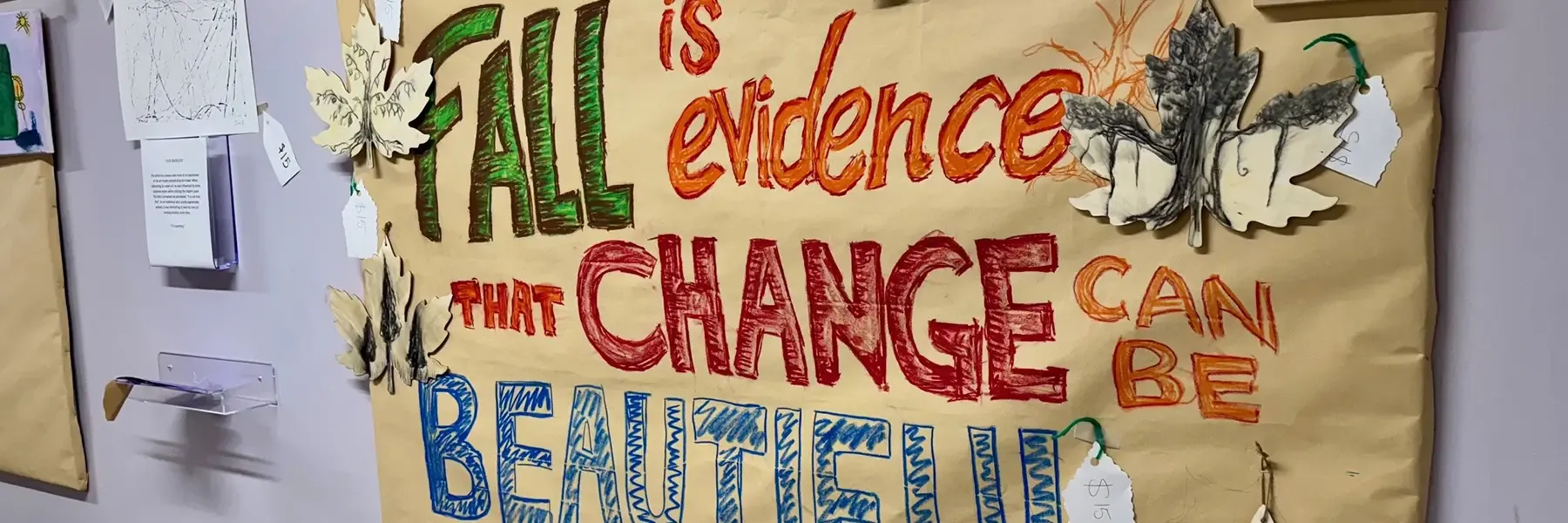 A colorful poster that says, 'Fall is evidence that change can be beautiful.'