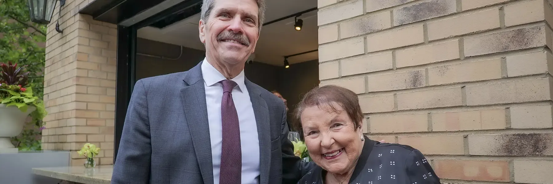 Envision CEO celebrates the retirement of a board member.