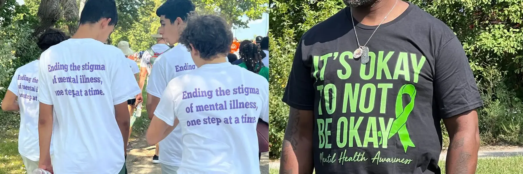 People in outdoor community setting wearing mental health awareness campaign t-shirts with supportive messaging.