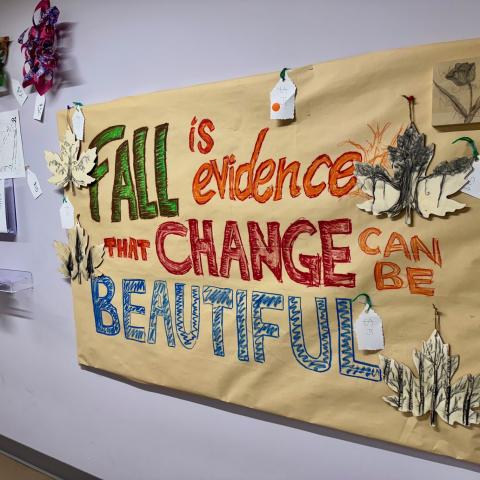 A colorful poster that says, 'Fall is evidence that change can be beautiful.'