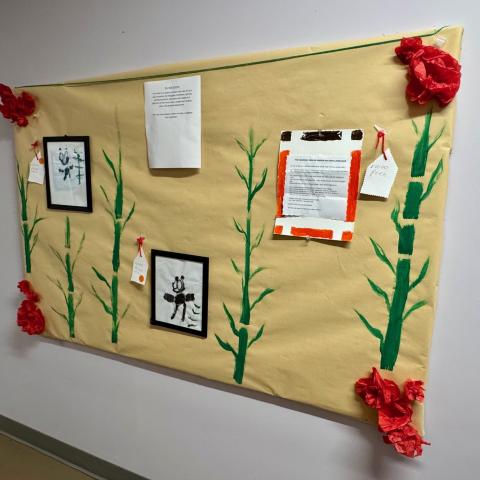 Artwork resembling flowers on a wall.