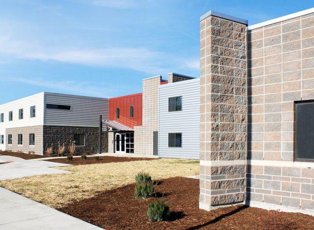 An exterior of a housing complex is pictured